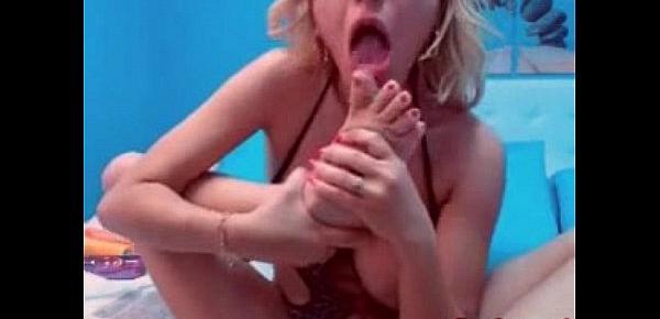 Big tit blonde milf fingers her pussy and her ass on webcam
